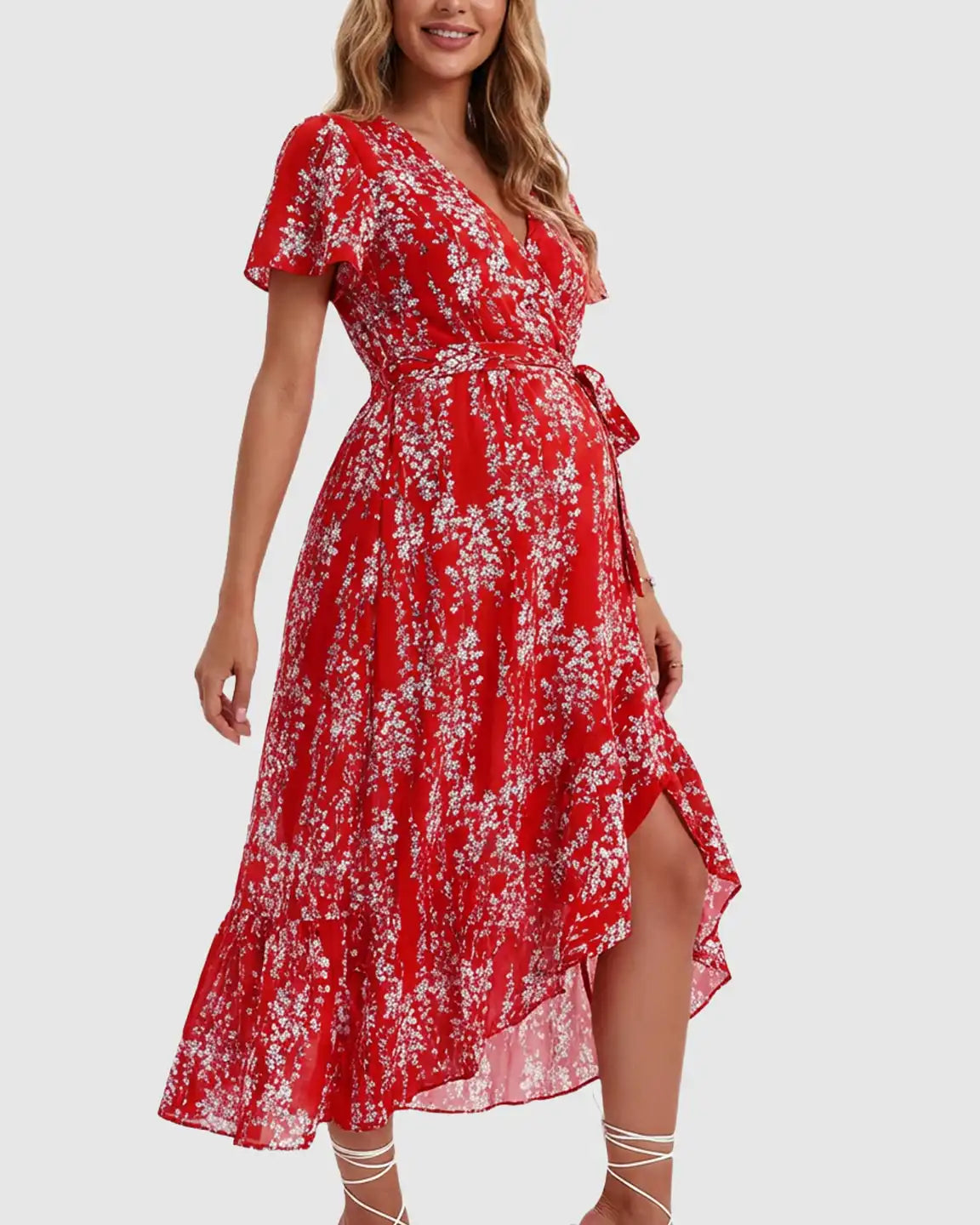 Red floral V-neck ruffled hem maternity midi dress with short sleeves and a tie waist.