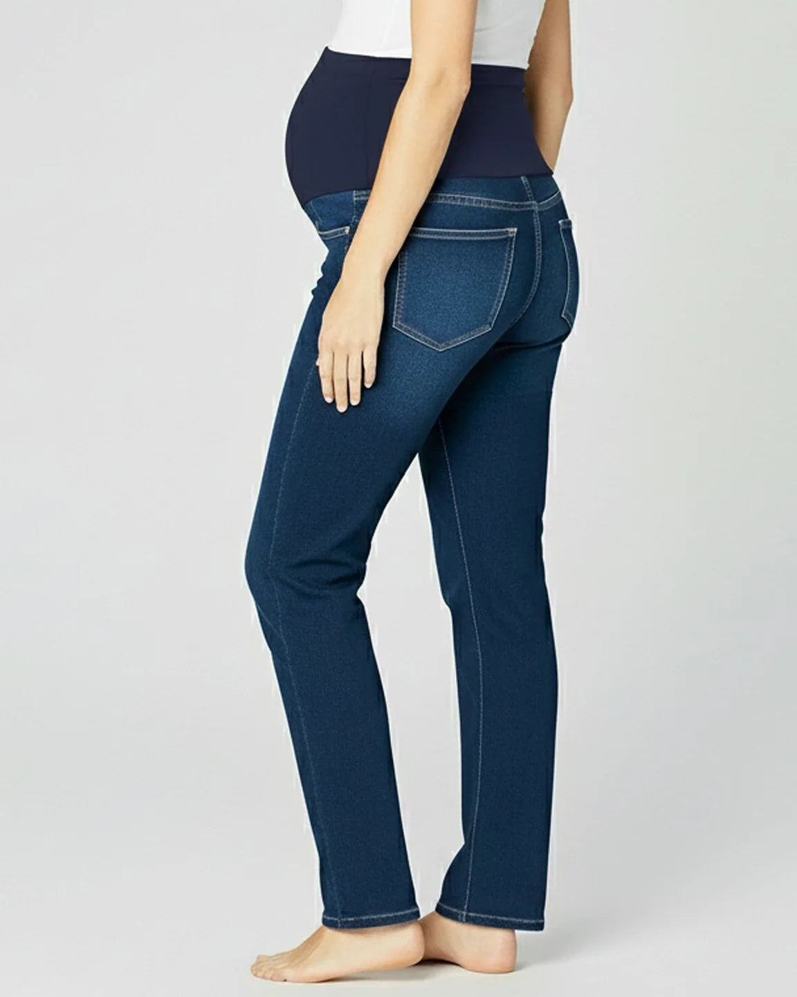 Dark wash maternity jeans with a navy belly support panel and straight leg fit.
