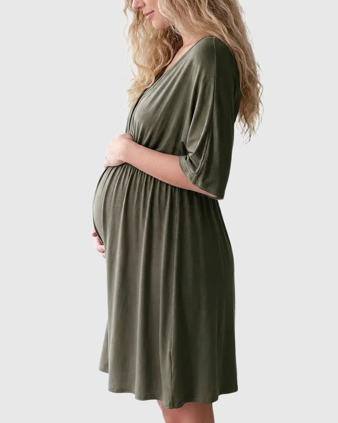 Maternity midi dress in olive green, featuring a cross-front, V-neck, 3/4 sleeves, and flowy A-line silhouette.