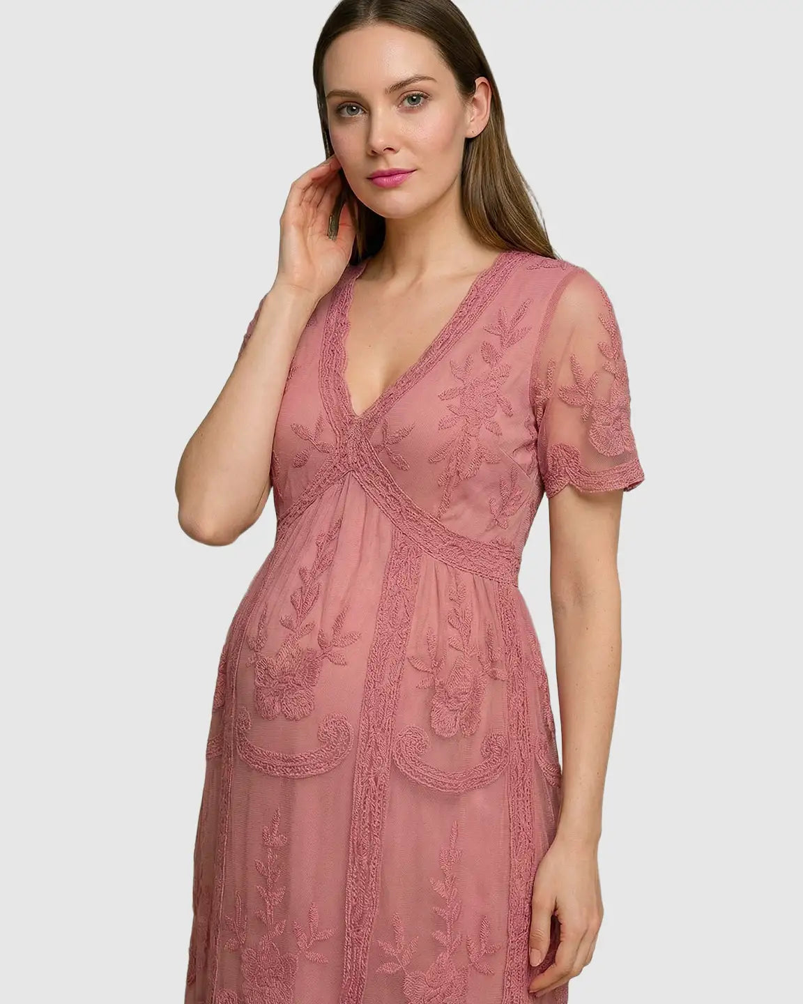 Pink lace maternity midi dress with V-neck, short sleeves, and floral embroidery.