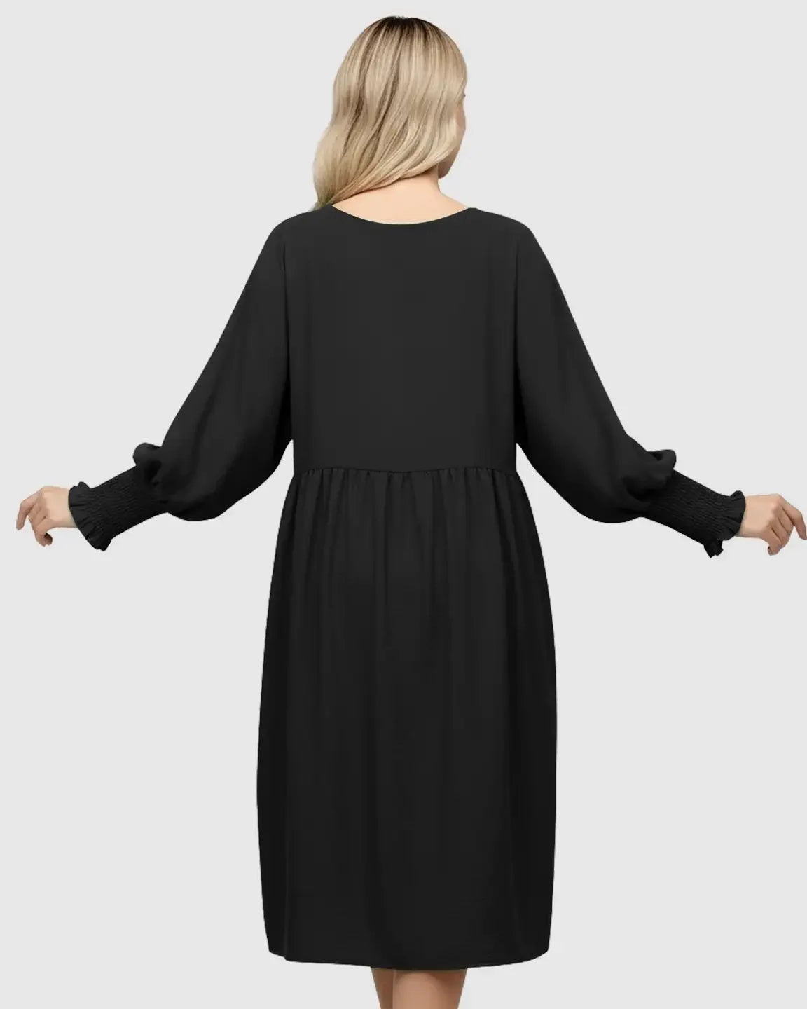 Black smocked sleeve casual dress with round neckline and drawstring waist, viewed from the back.