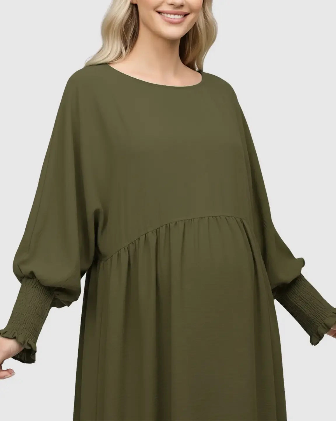 Olive green smocked sleeve maternity dress with round neckline and relaxed fit.