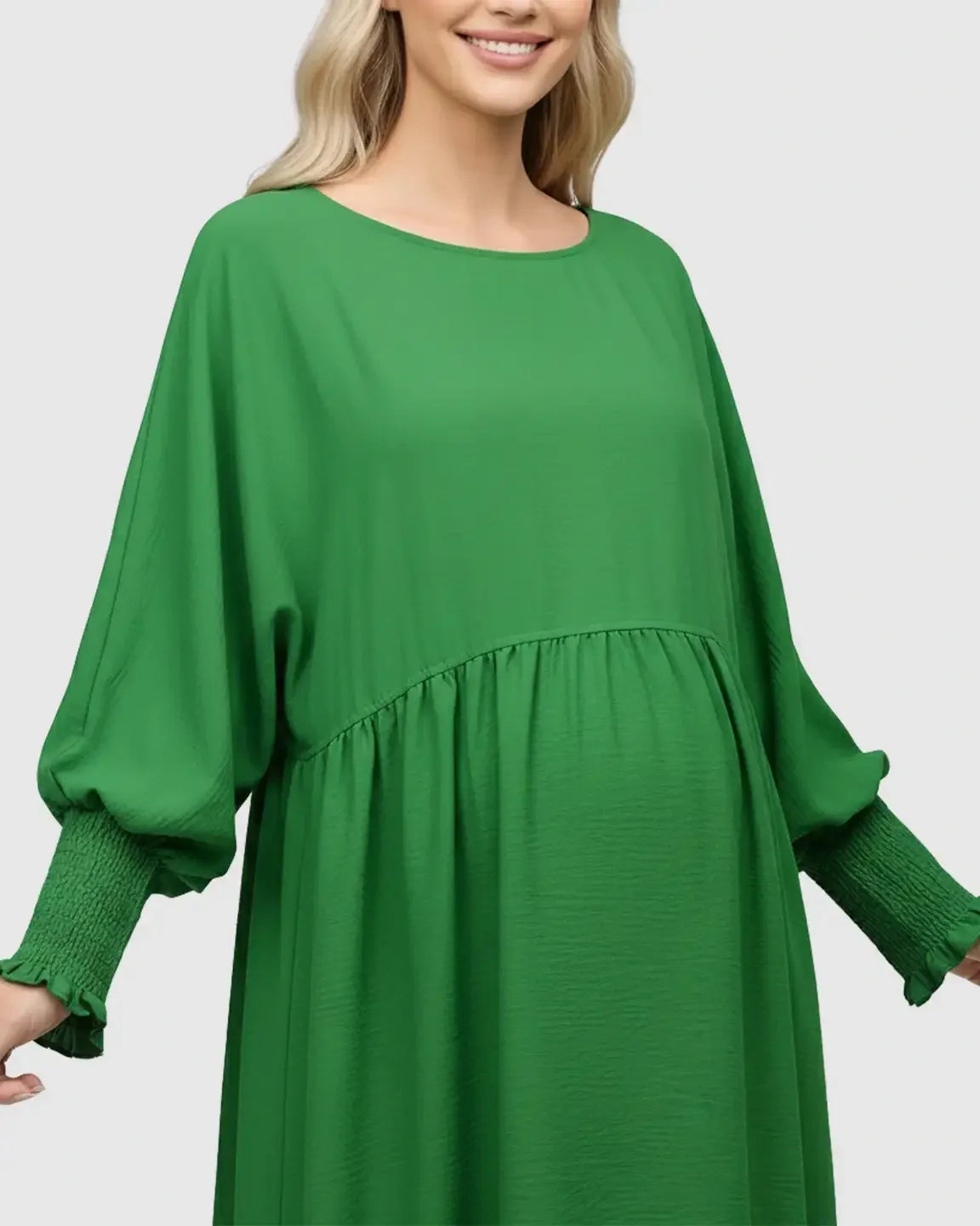 Green Flowy Smocked Sleeve Casual Dress with round neckline and three-quarter sleeves.
